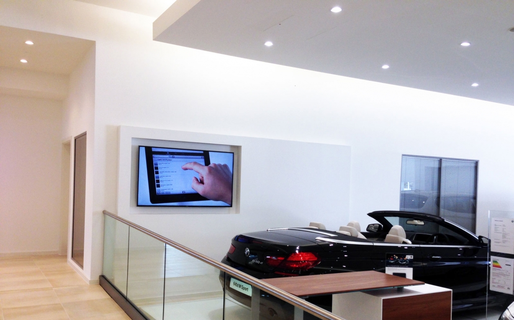 Car showroom AV install and corporate lighting solutions image